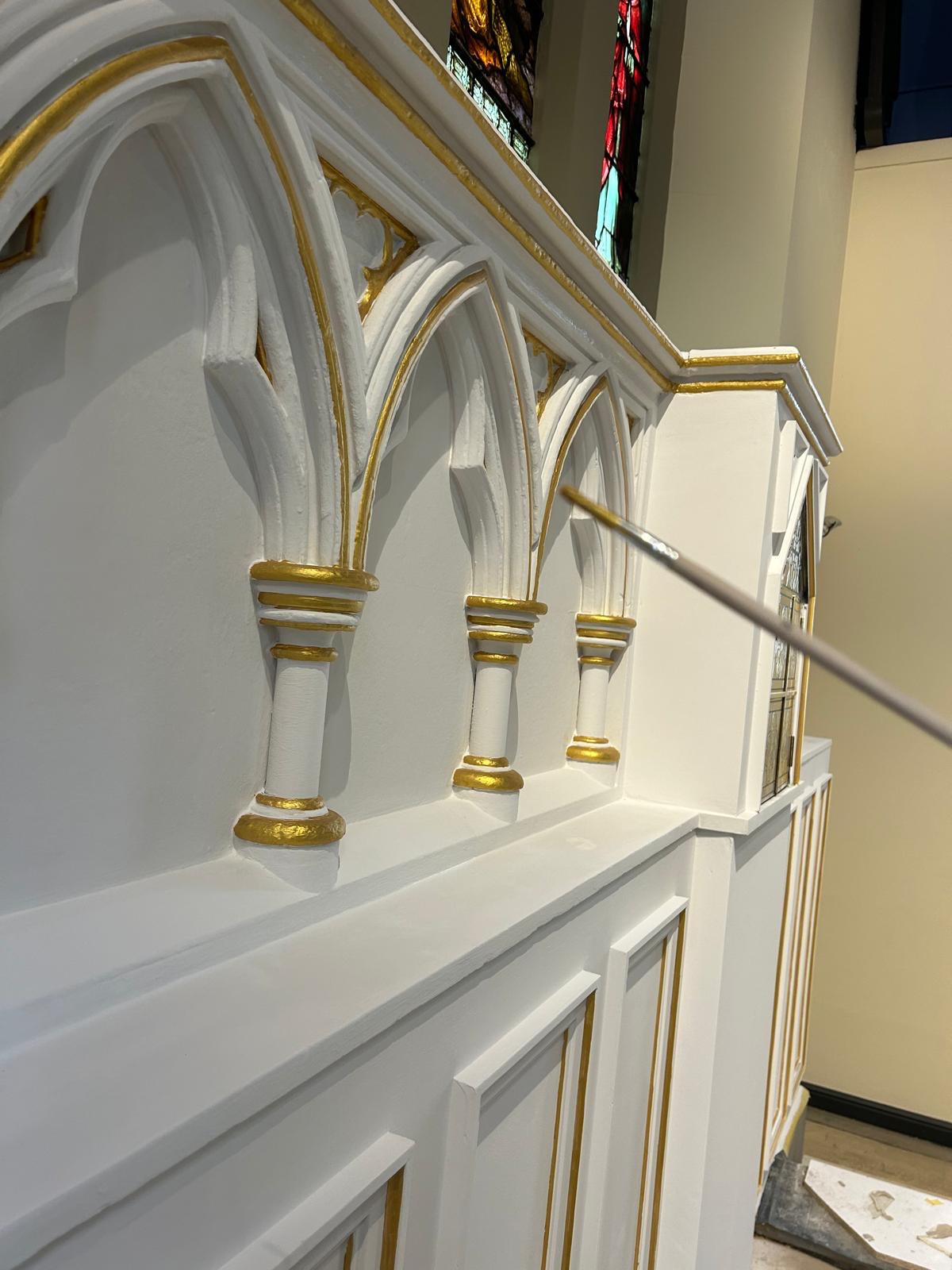 Restored gothic arches with hand-applied gold detail