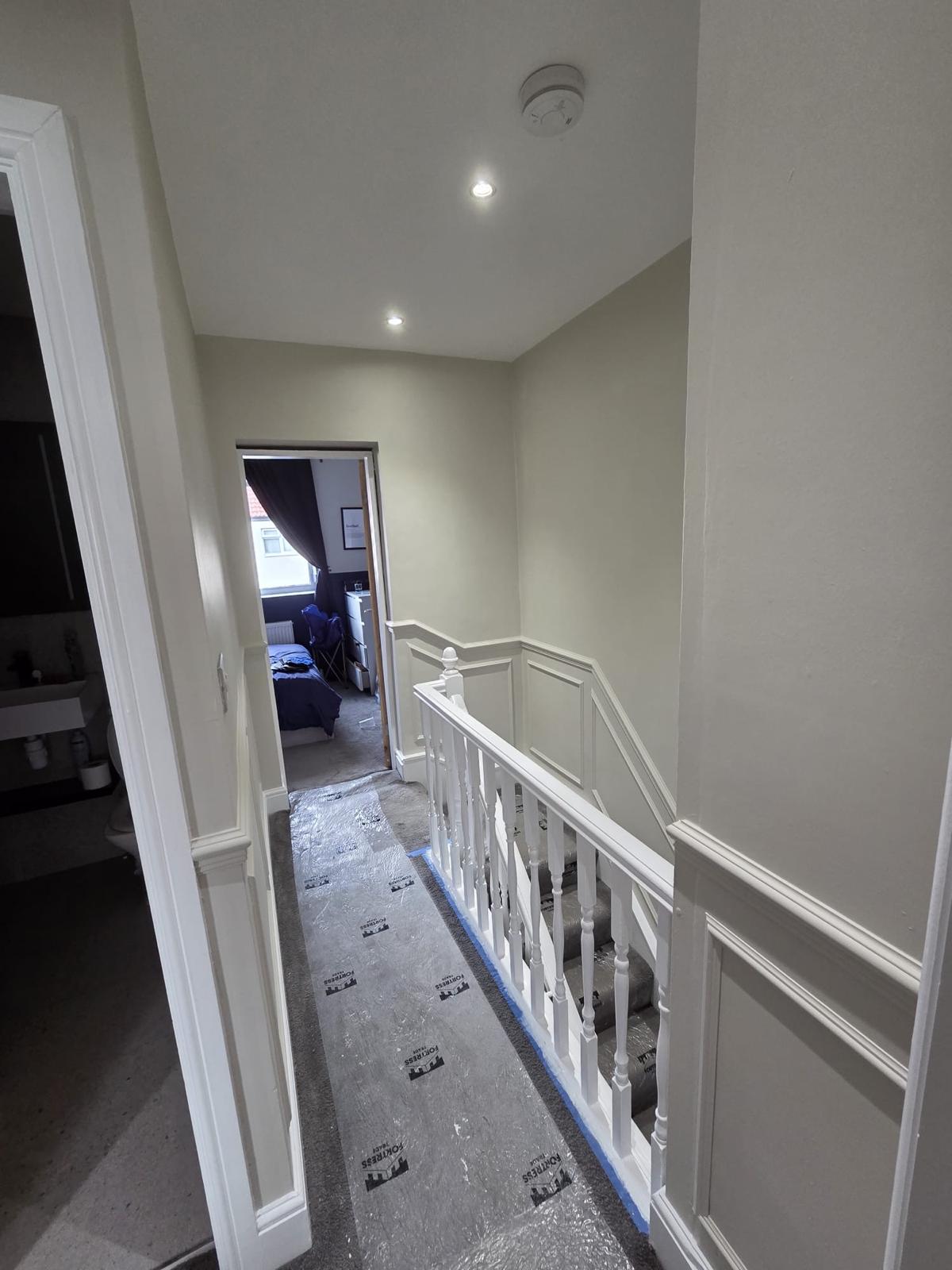 Landing with finished panelling and balustrade